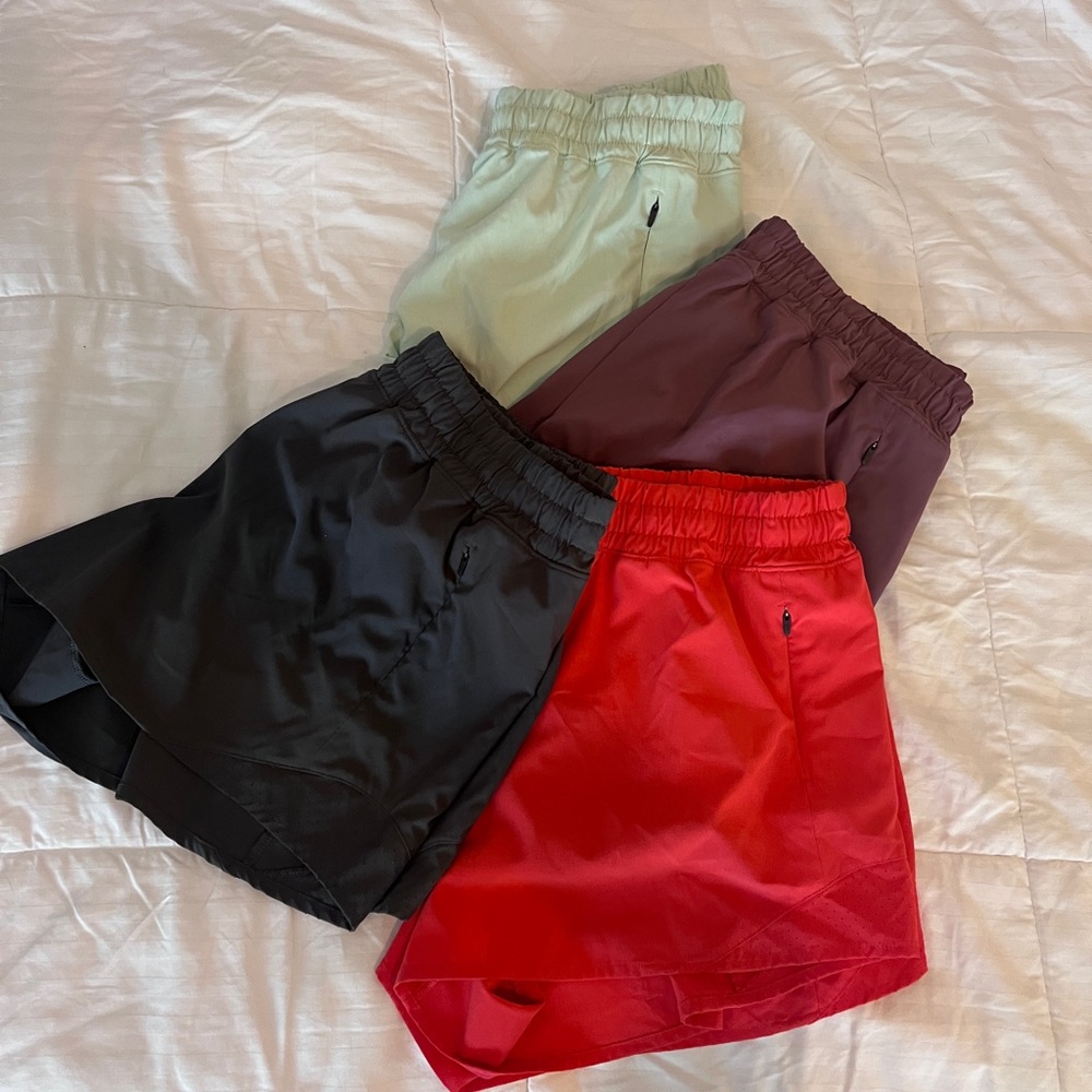 Set of Four Athletic Shorts in Red, Black, Purple, and Light Green